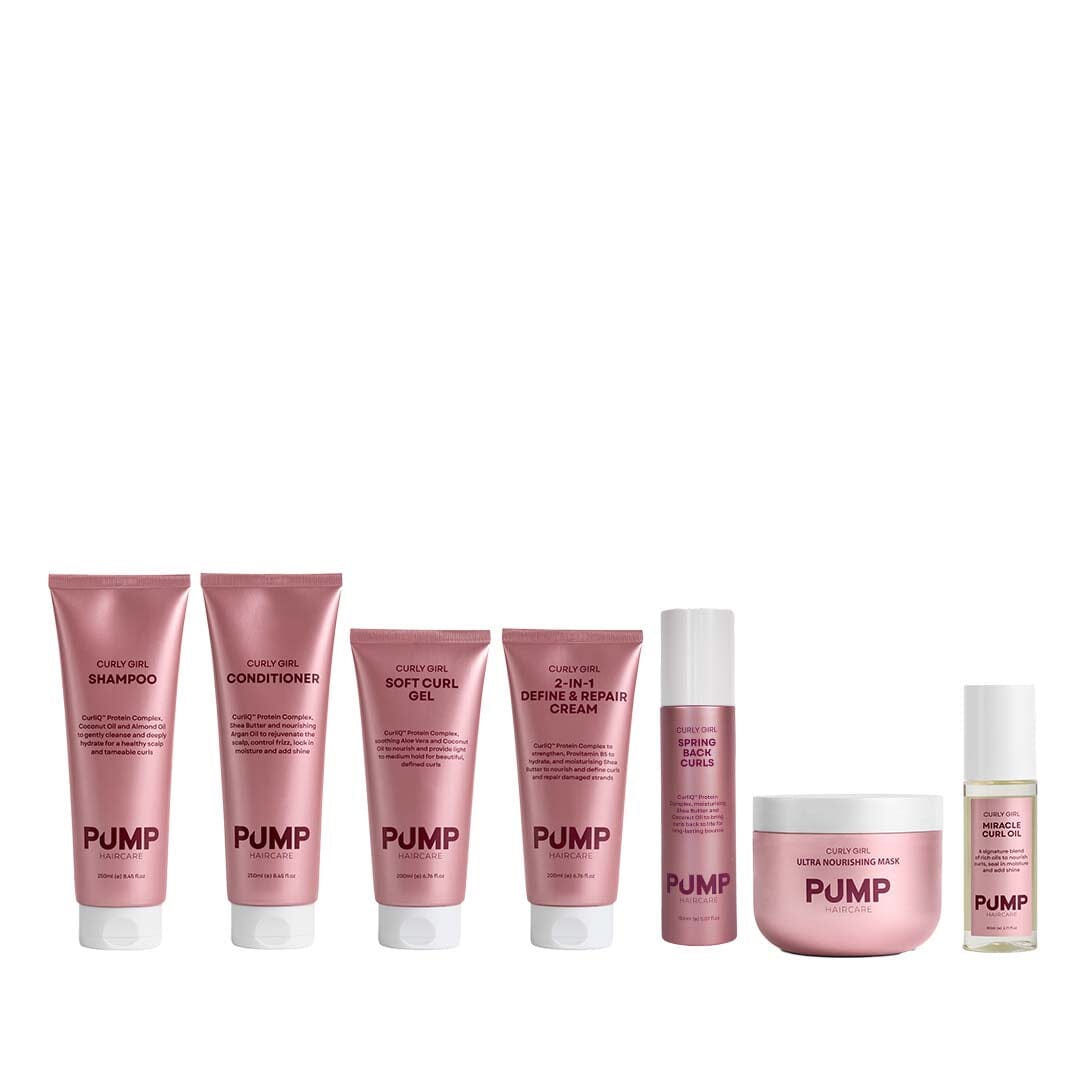 Set of pink hair care products with 'PUMP' branding on a white background