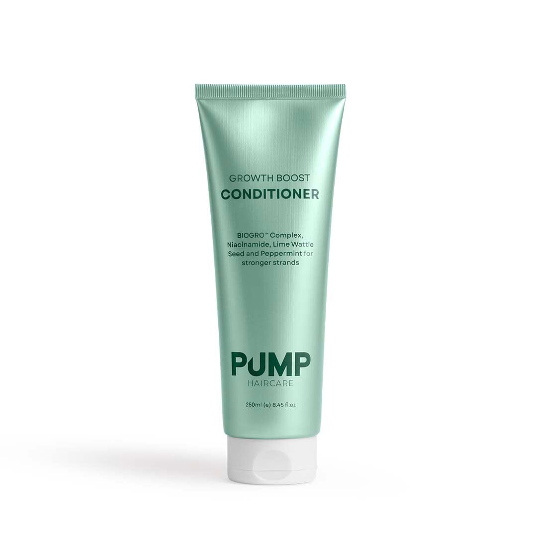 Green tube of Pump Haircare Growth Boost Conditioner on a white background