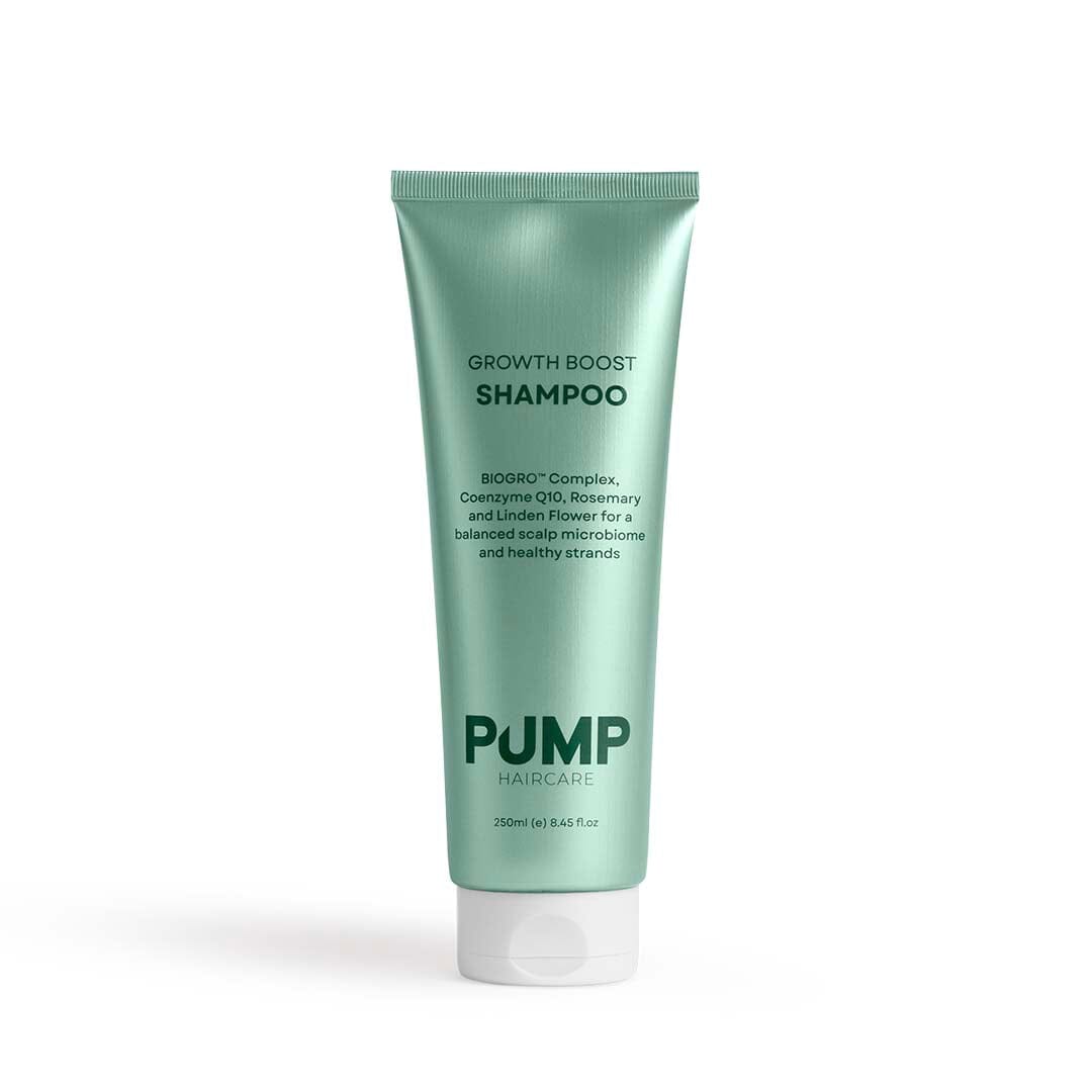 Green shampoo bottle labeled &
