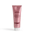 Pink shampoo tube labeled &