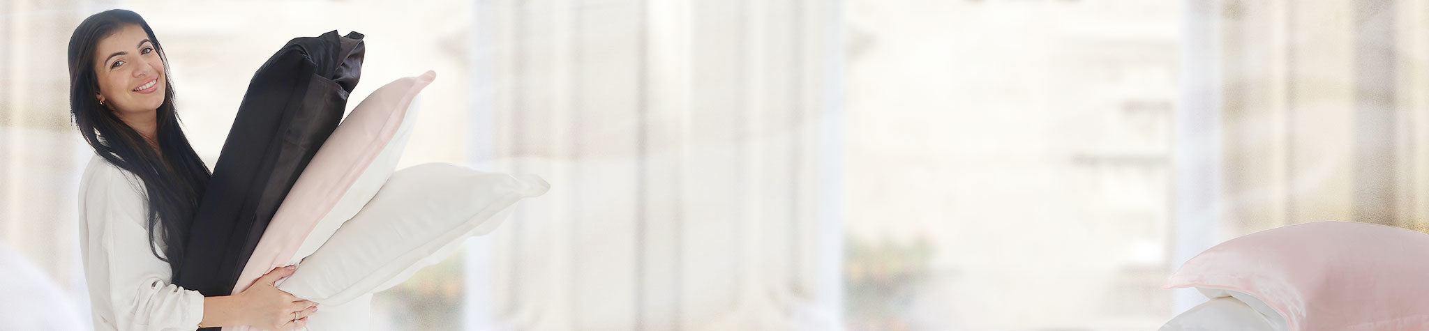 Mulberry Silks banner showing silk pillow cases on a soft bedroom background