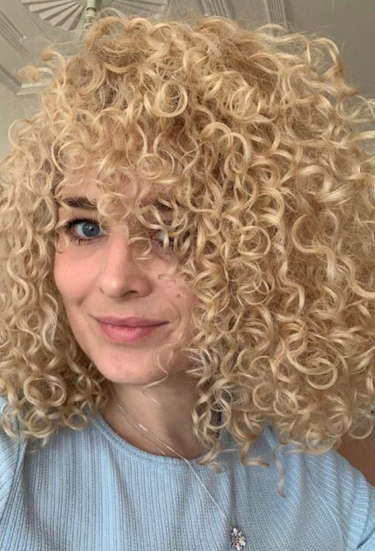 curly blonde pump haircare